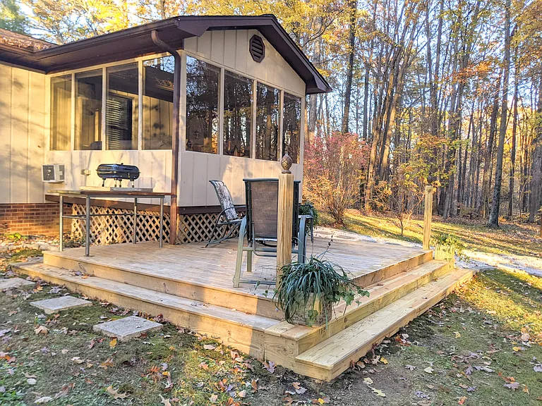 Back deck of the sunroom. Many call it the reading room, or checkers room.