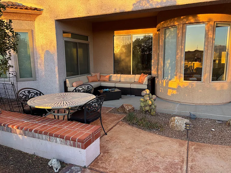 Outside dining and lounging area. You are seeing evening/sunset light. This area is shaded in the AM