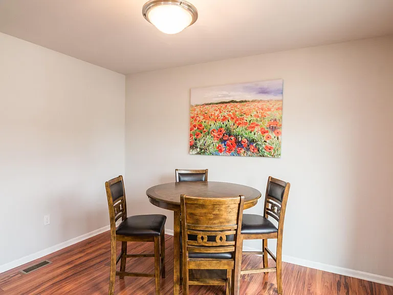 Large dining easily accommodates a large rectangular table
