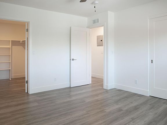 Master Bedroom with HUGE walk-in closet and slider closet.