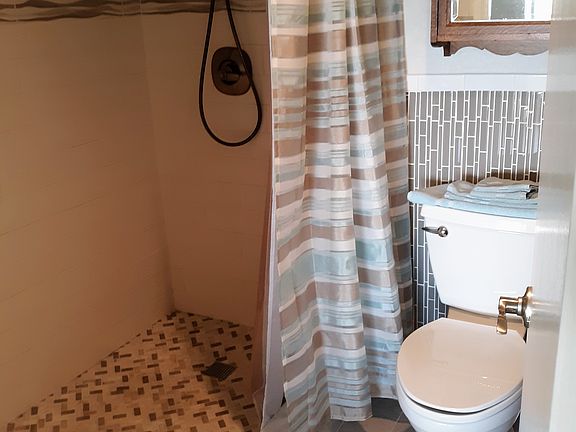 Huge tile shower open entry 