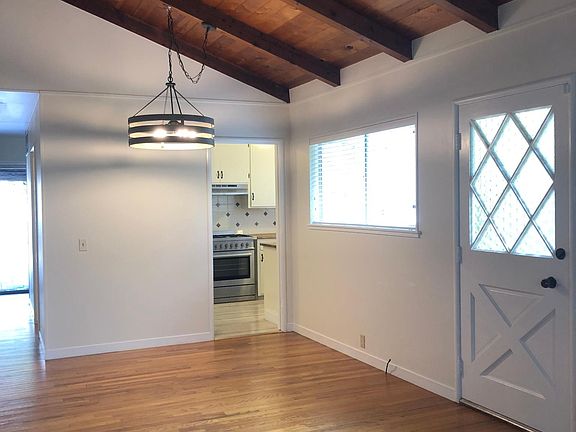 Open floor plan with hardwood floors throughout.