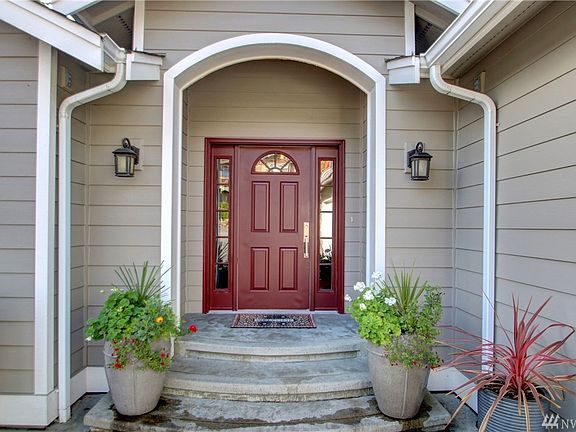 Welcome to this beautiful Maddox Creek 4 bedroom, 3 bath custom home! The courtyard entrance offers great curb appeal!