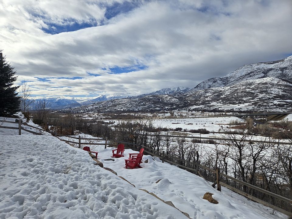 Large backyard with firepit