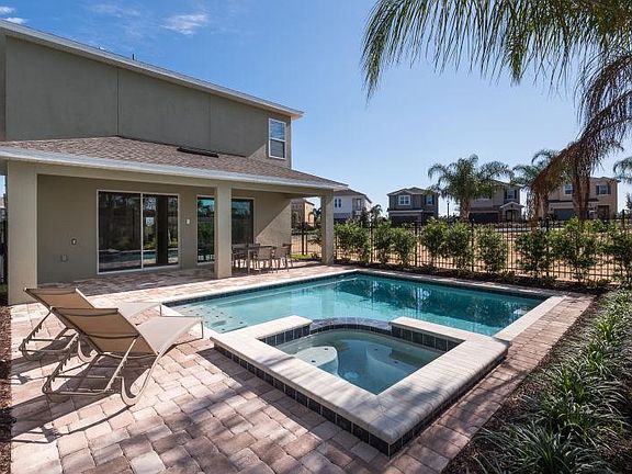 The swimming pool in the back yard(B)