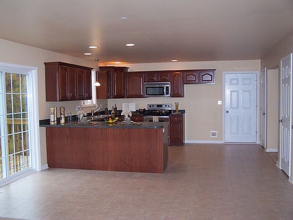 Oversized Kitchen with Built-in Breakfast Bar