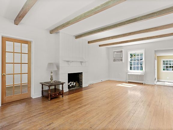 living room adjacent ot family room, den and dining room