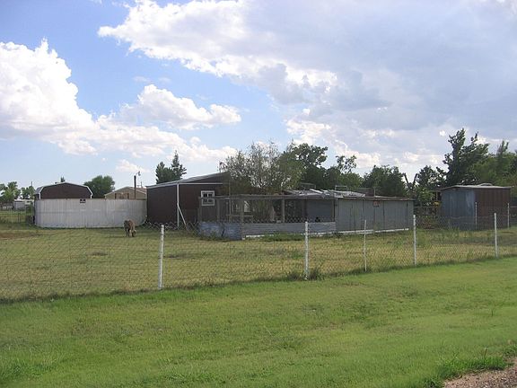 outbuildings and land