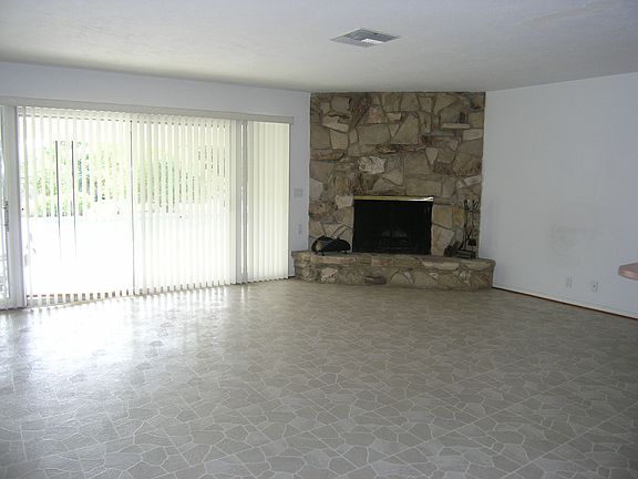Family room w/Rock Inlay Fireplace 
