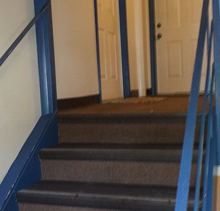 Interior steps leading to unit