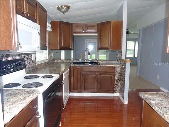 4th image of 5796 Swaying Palm Dr