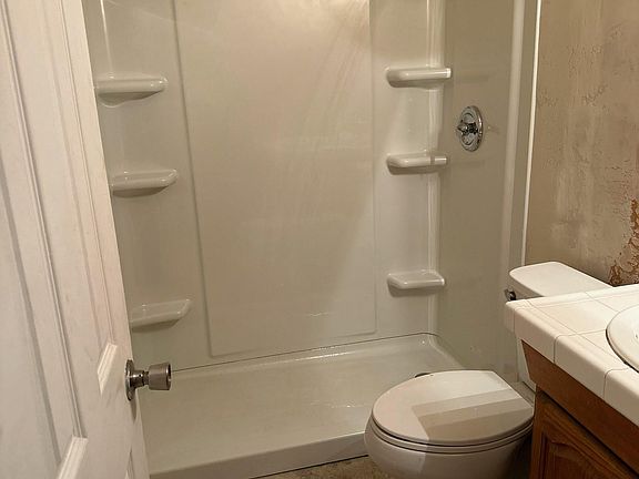 Common full bathroom. Shower was redone recently.