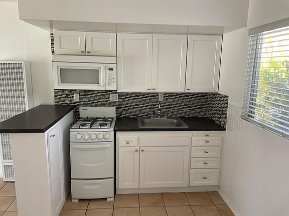 Plenty of work space and cabinets for storage