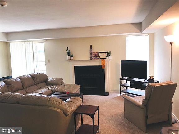 Spacious Living Room with Fireplace