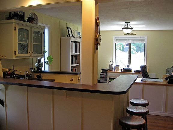 Bar and office next to family room