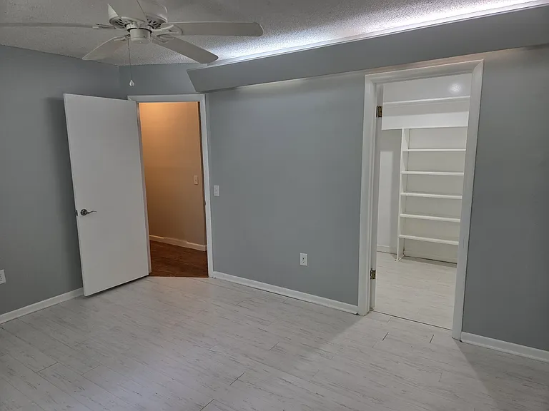 2nd bedroom showing large walk-in closet
