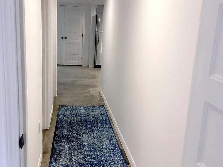 Hallway to bedrooms and bath