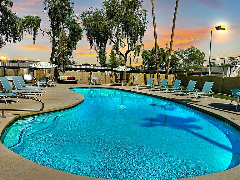 Enjoy the COMMUNITY POOL and HOT TUB with JETS, along with new pool furniture and tables for your comfort and relaxation!