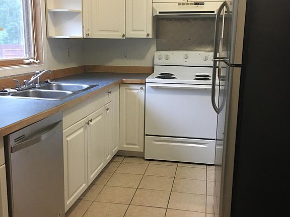 Kitchen from laundry area - the stove has been replaced sinc