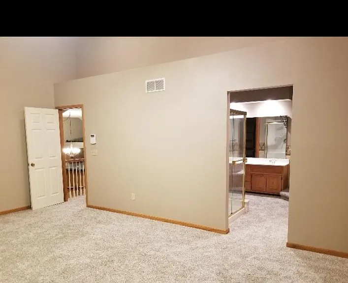 Master bedroom (entry door and bathroom area entryway)