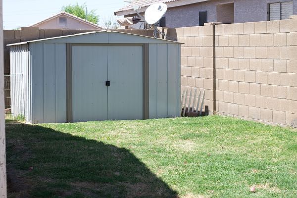 Backyard with storage shed