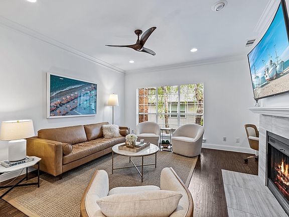 Living room with gas fireplace.