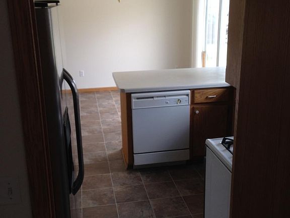 larger kitchen, open to dining room