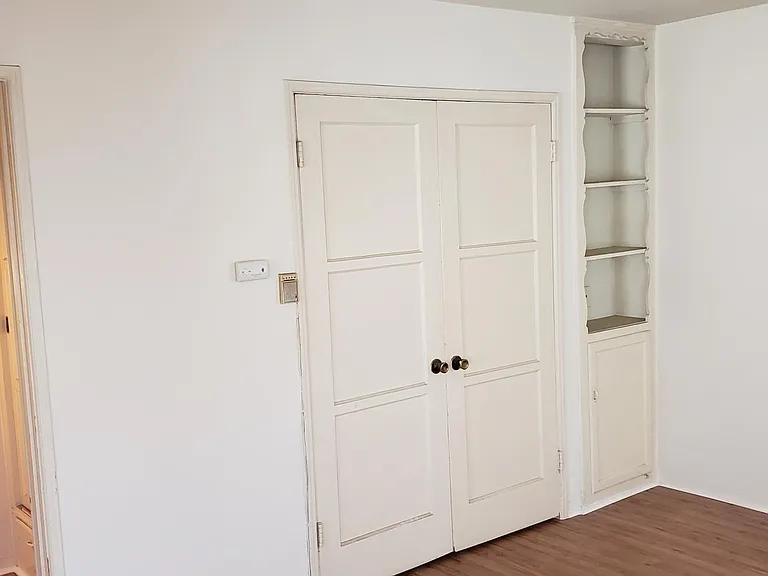 Built-in Murphy bed with new full sized mattress included.
