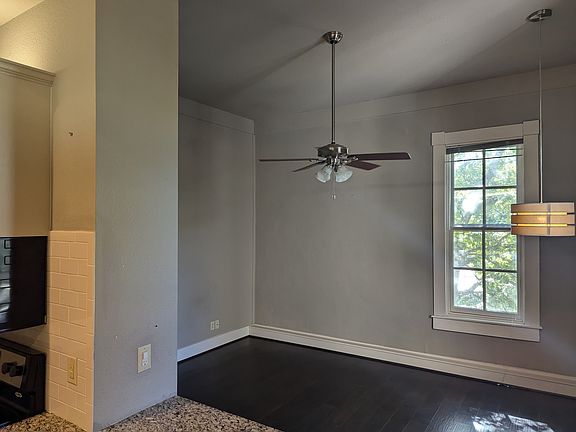 Open concept living and dining. High ceilings. Large windows overlooking the large garden. Newly installed windows. No street noise.