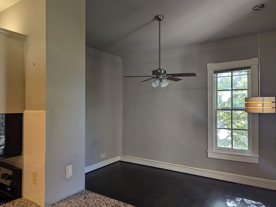 Open concept living and dining. High ceilings. Large windows overlooking the large garden. Newly installed windows. No street noise.