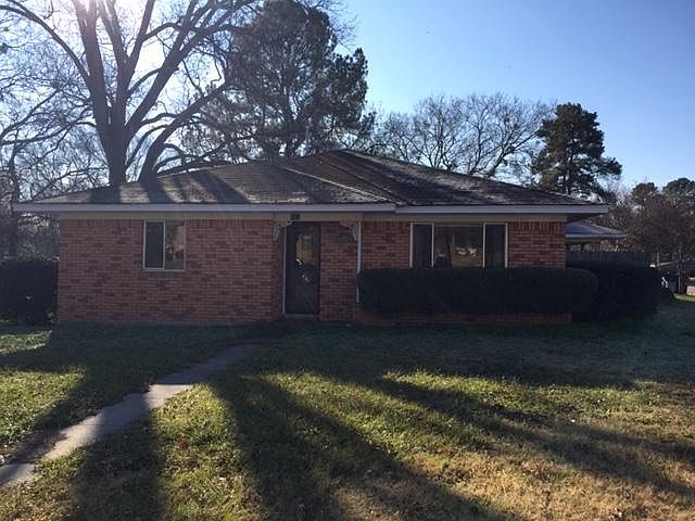 Front view from Yates Street. Living room on right. Bedroom on he left