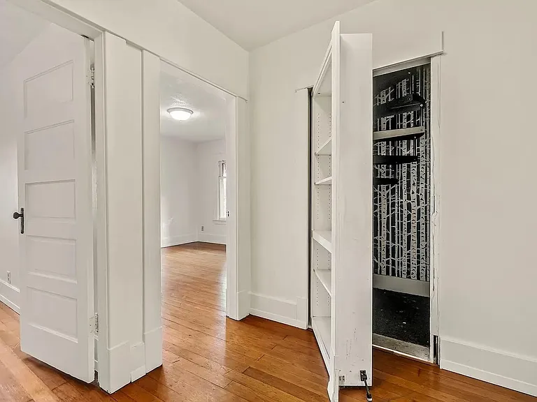 secret bookcase leads to upstairs attic space