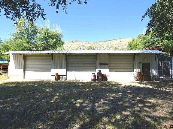 3 bays and workshop area.