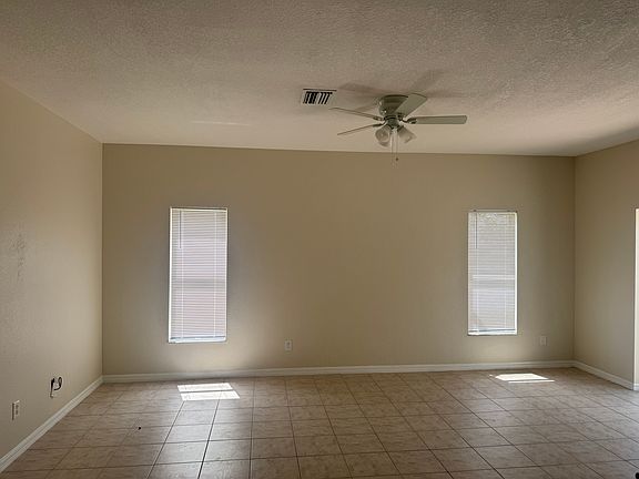 Family room view from dinette area and kitchen