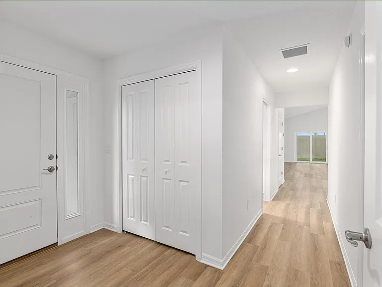 Main Entrance, Hallway to the Living Room and Kitchen