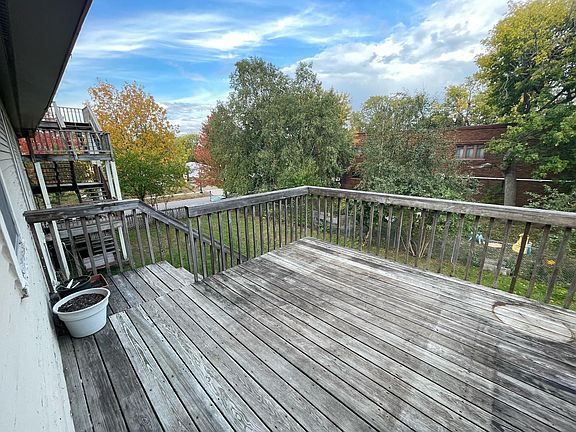 main deck overlooking large yard