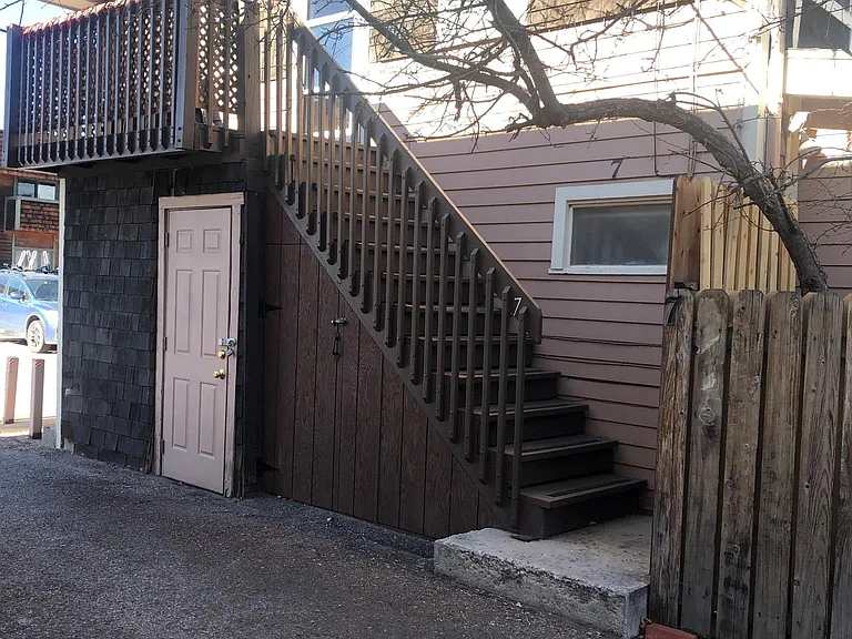 Stairway up to private entrance and baloncy