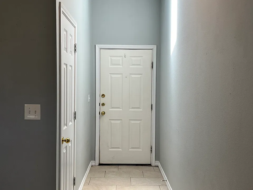 Entry Way with Skylight and entryway closet.