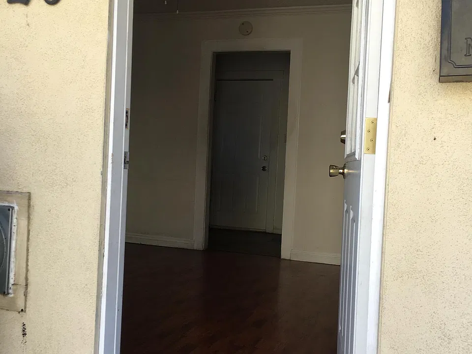 Entrance to unit, with view of living area