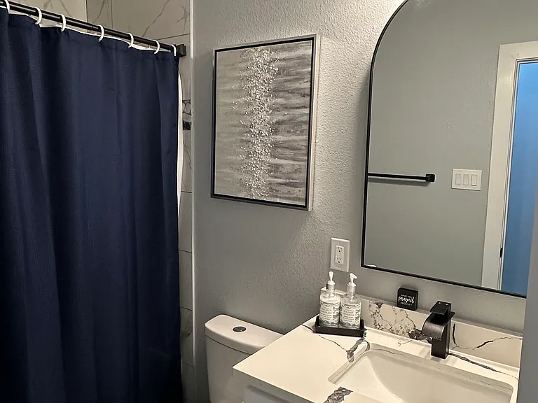 2nd bathroom with Tub shower.