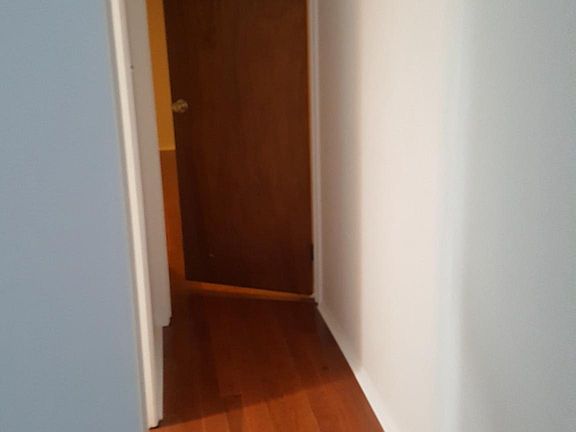 Bright living room faces east overlooking 4th Street