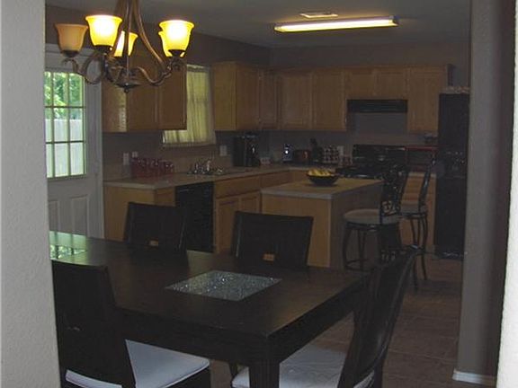 A view of the open dining/kitchen.