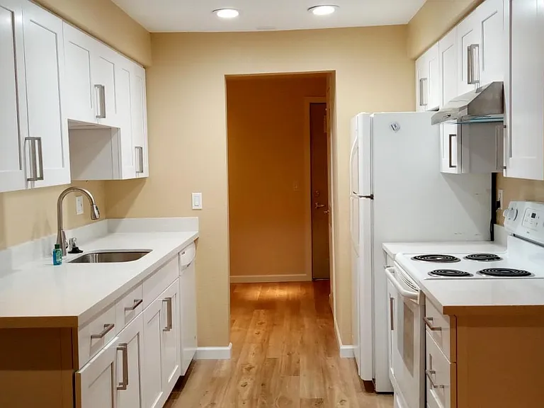 Everything brand new remodeled Kitchen Cabinets and quartz slab countertop, wood floor.
