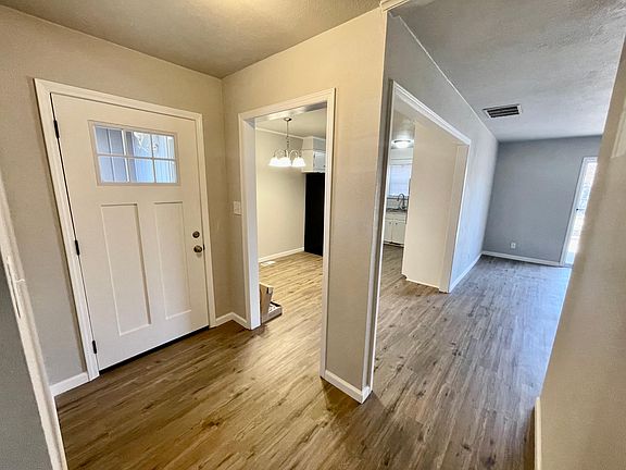 Front entry, looking into kitchen and living room
