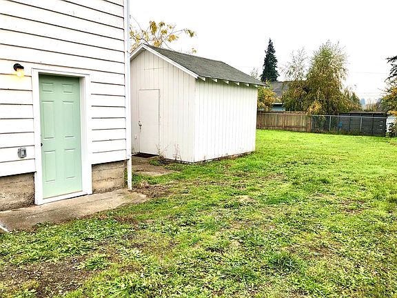 Back door, shed and yard