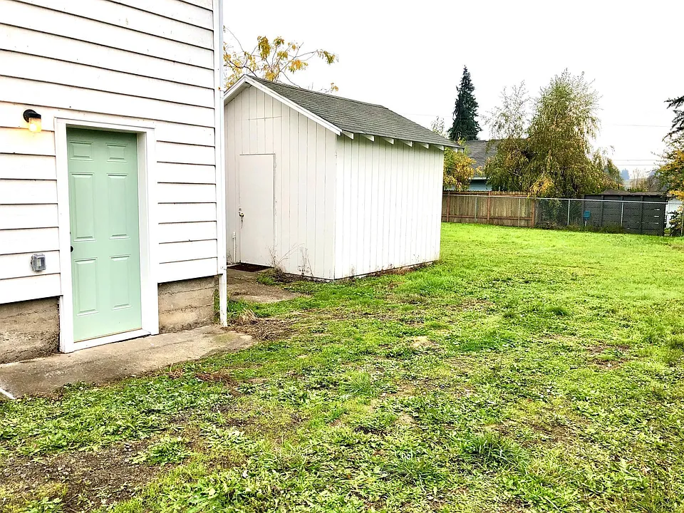 Back door, shed and yard
