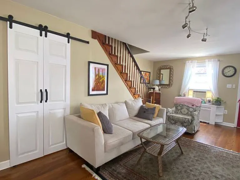 living room + door to basement
