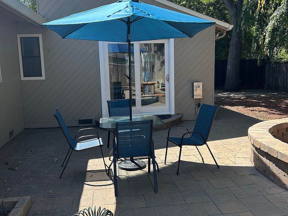 SHared patio area looking at sliding glass door entry