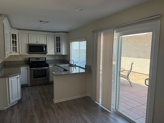 Enjoy your own private backyard with plenty of space for outdoor dining, relaxing, barbequing or gardening. Additional attic storage provides room for seasonal decorations and extra belongings.