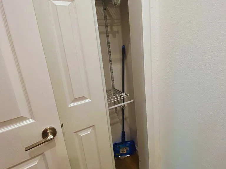 Spacious closet with hangers and plenty of storage space.